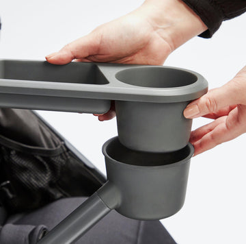 Image of a person attaching the Roam Snack & Drink Tray